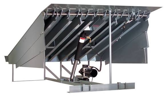 Industrial dock leveler connecting warehouse dock to trailer